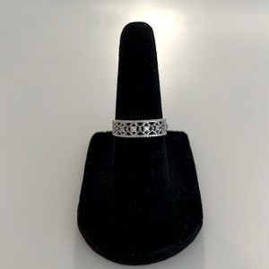 Sterling silver and diamond chip wedding band.